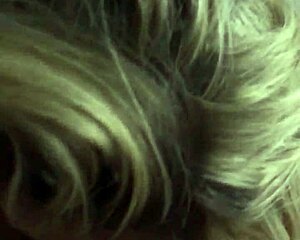 hot blonde with big tits plays with cock and gives blowjob