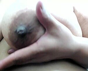Topless woman with large breast streaming live on cam