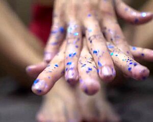 babe gives sensual footjob to rubber cock