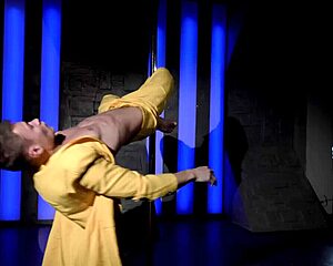 Young and straight strip tease with a pole dance performance