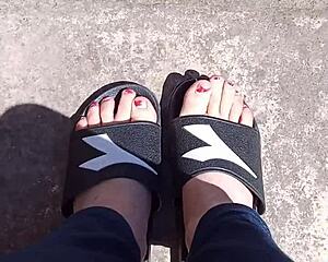 Feet soaking up the sun before pedicure