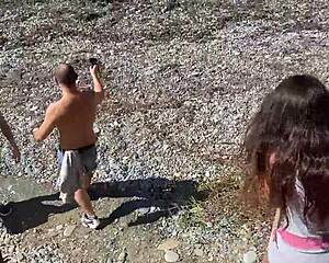 Four strangers satisfy a beach girl with their cocks