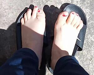 Feet soaking up the sun before pedicure