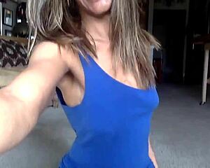 Steamy ginger MILF teases with wet nipples and ass