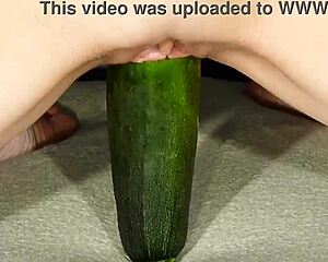 Yo, watch this teen go hard with a big zucchini for wet solo fun