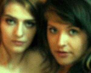 Carrie B and Savannah Tease with Double-Ended Dildo in Skinny Photoshoot. Watch Their Sucking Skills!