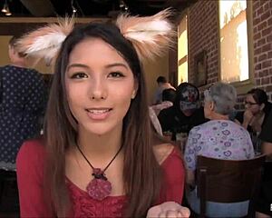Woman in fox costume performs in high definition.