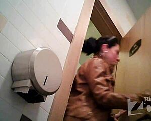 Indian girl caught on hidden cam with big fleshy vagina in public toilet.