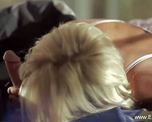 An amazing blonde gives an exotic blowjob in a bedroom