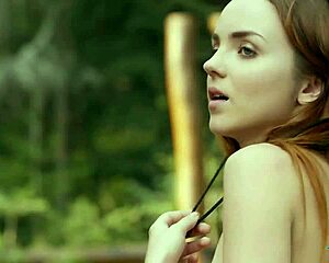 Tiny teen Playboy model Kate Great strips naked while chopping wood outdoors