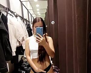 Sexy girl triggers risky orgasms in fitting room