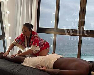 Asian masseuse Lina Nakamura gives pleasure to a black man