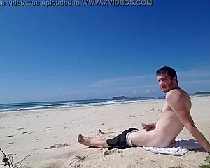 A gay guy jerks off on the public beach in outdoor masturbation