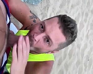Watch this public blowjob on the gay beach