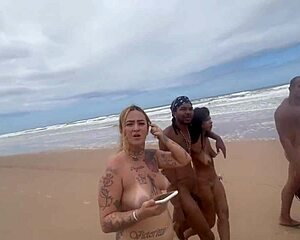 Having an orgy on the nudist beach with beautiful African teens.