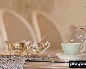 Classy babe with big booty strips to show shaved pussy.