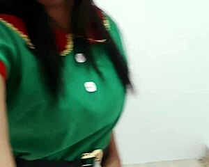 Sultry MILF in Christmas costume dancing on her desk