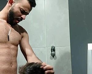 Muscle hunk gets his cock sucked in the gym