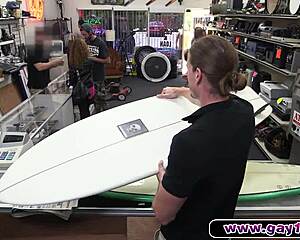 blonde muscular surfer dude shows off his body