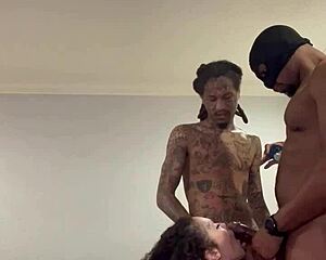 A gang bang with a masked man and big black cock