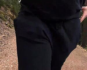 Chubby exhibitionist masturbates outdoors in the forest