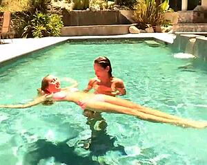 Her friend came over and they kissed outdoors passionately