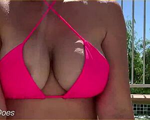 Married woman exposes her breasts in a hotel pool