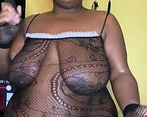Femdom Ebony Shows Off Big Tits in Verification Clip.