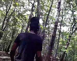 Submissive licks ass and deep throats cock in forest with spitting and gagging