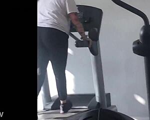 big booty girl walks on treadmill at gym