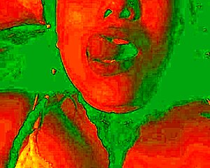 The exotic bluee shows her face of pleasure.