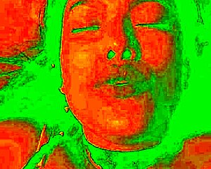 The exotic bluee shows her face of pleasure.