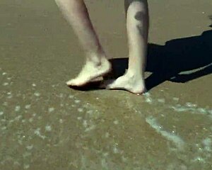 Sexy teen Agnes bathes in the ocean