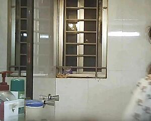 Hot girl takes shower and is being watched