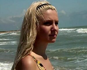 Sexy teen Agnes bathes in the ocean