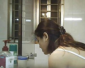 Hot girl takes shower and is being watched