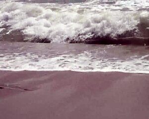 Sexy teen Agnes bathes in the ocean