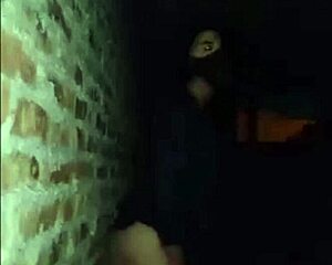 Young girl touches herself outdoors