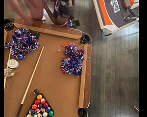 cheerleader performs at the pool hall