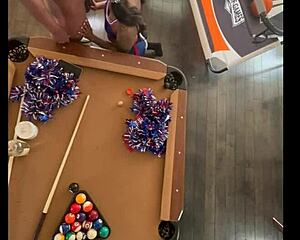 cheerleader performs at the pool hall