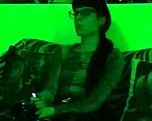 Look at Beth, the sexy goth domina, smoking in green light HD