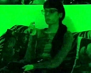Look at Beth, the sexy goth domina, smoking in green light HD
