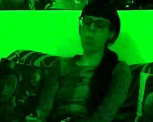 Look at Beth, the sexy goth domina, smoking in green light HD