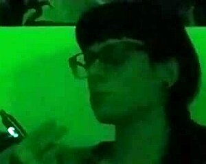 Look at Beth, the sexy goth domina, smoking in green light HD