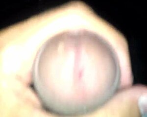 Old Man Pissing Into Mug