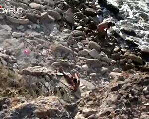 horny chick on the beach says fuck me stranger while flashing tits to voyeur