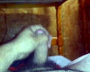 Why not stroke that cock on the bed?