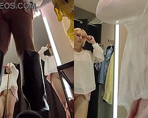 yo, check this upskirt view in a public fitting room on a blonde with big tits, so hot! 😍