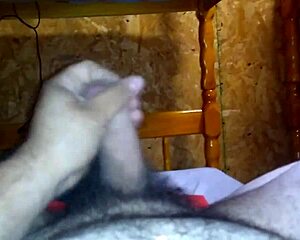 Why not stroke that cock on the bed?