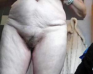 German Granny Fucks Hairy Pussy with Cucumber in Wild Kitchen Scene
